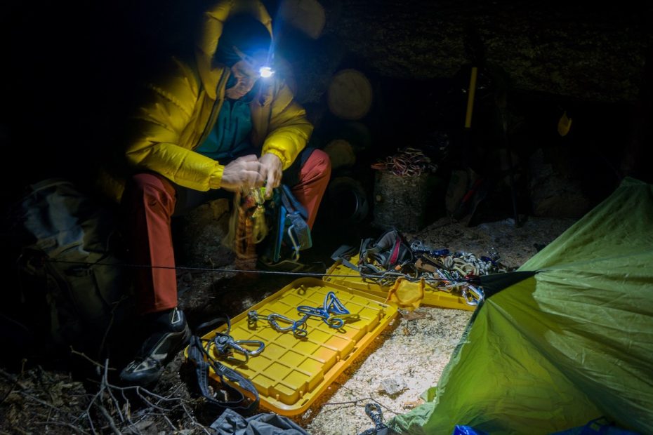 Scott Coldiron stays warm in the Valandre Troll jacket while sorting gear in the Cabinet Mountains Wilderness, Montana. [Photo] Brian White