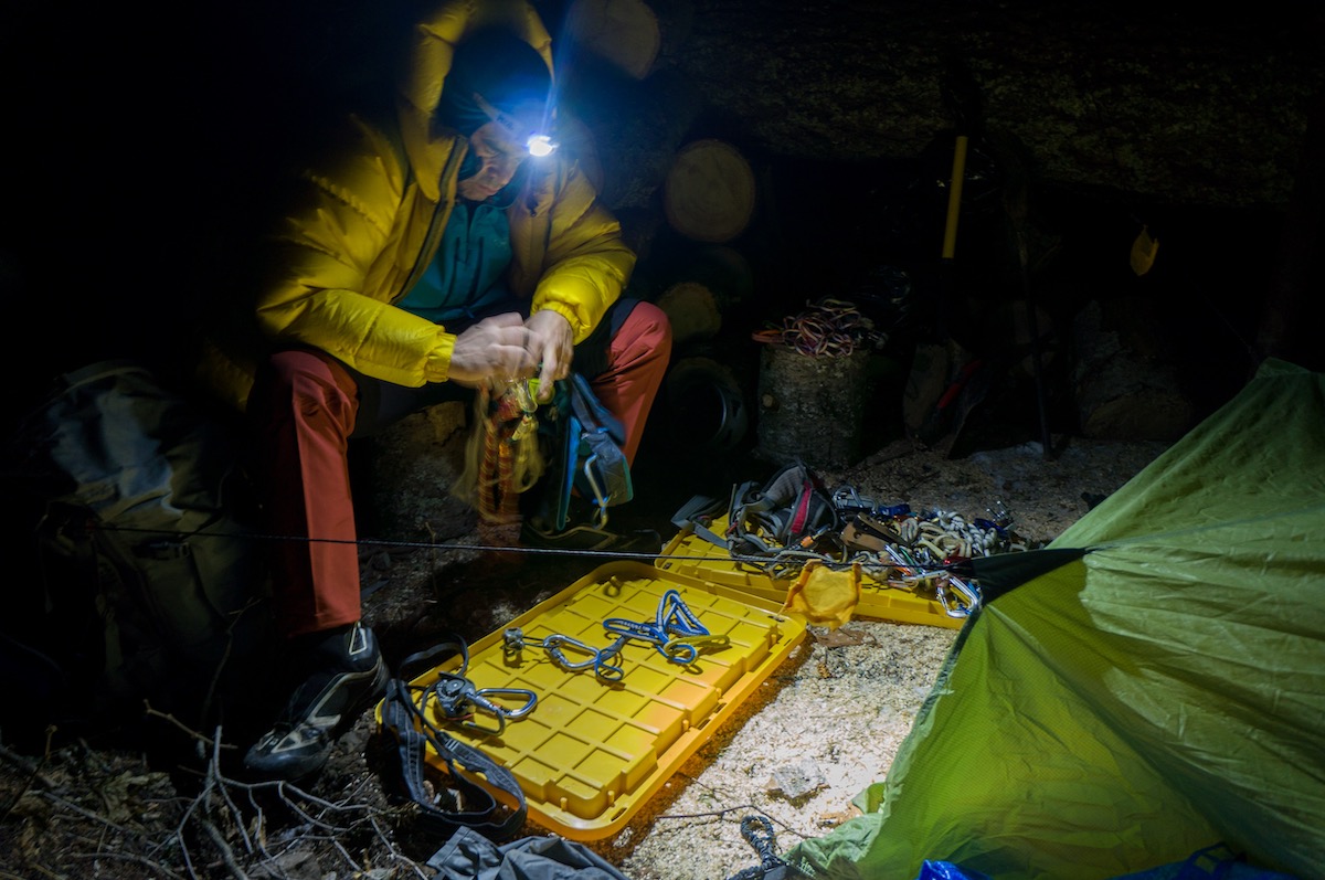 Scott Coldiron stays warm in the Valandre Troll jacket while sorting gear in the Cabinet Mountains Wilderness, Montana. [Photo] Brian White