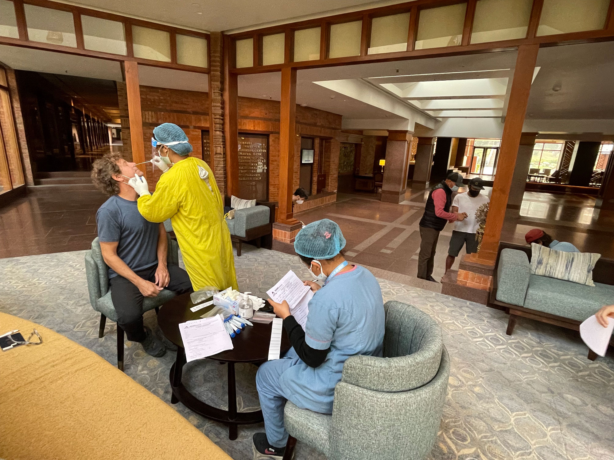 wfeature-pandemic-impacts-3 COVID testing in the Yak and Yeti Hotel, 2021, Kathmandu, Nepal.