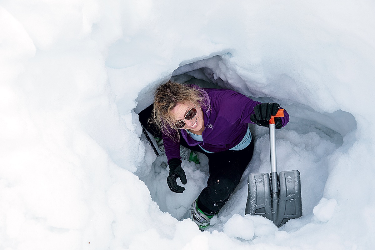 Almost two months after the avalanche at Sentinel Pass buried Kadatz beneath thirteen feet of snow, she and Banfield returned to the site to recover the skis she and Schumacher had lost during the accident. To retrieve her skis, Kadatz had to dig back into the hole where she'd been buried for nearly twenty-five minutes. [Photo] Tim Banfield