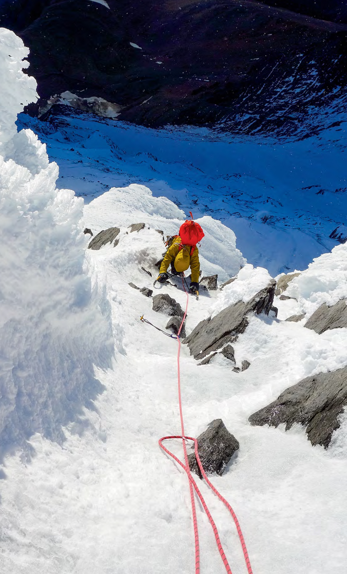 Hawthorn on the second-to-last pitch of Running in the Shadows. The final 150 meters of ice led past giant rime features to the summit. The climb reminded Hawthorn of winter routes in Scotland. [Photo] Ethan Berman
