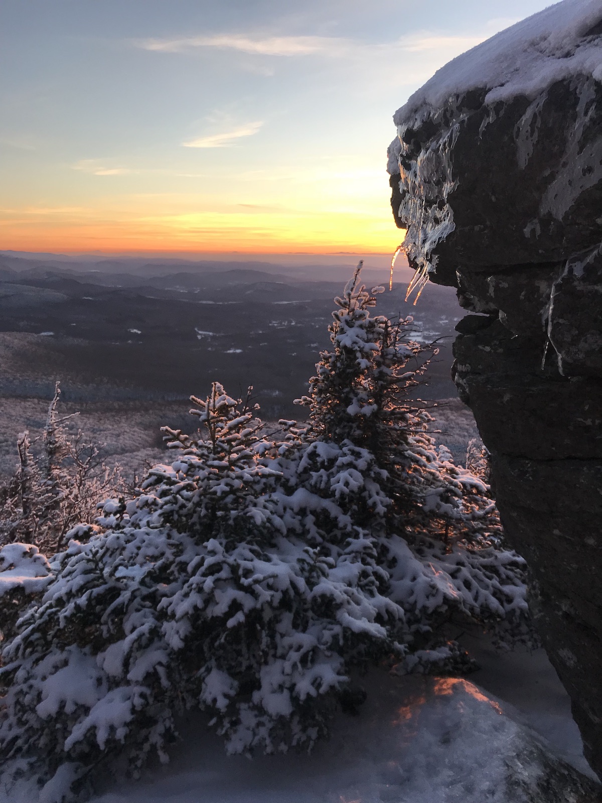 Sunset from the flanks of Mozodepowadso (Abenaki name for Mt. Mansfield), Green Mountains (Askaskwiwajoak), Vermont, Abenaki territory. [Photo] Katie Ives