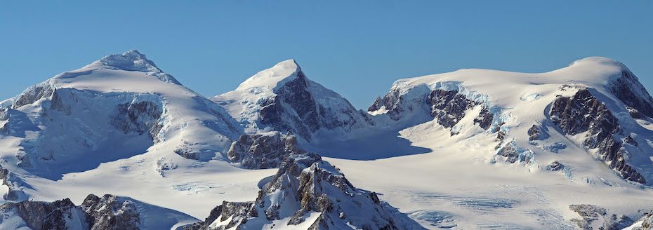 Image 1 of 2: This photo and the one below originally appeared as a panorama across two pages in Alpinist 75; it has been split into two frames to allow for better viewing on the webpage. It shows the view from Mt. Ilse (2506m), during its first ascent by Natalia Martinez and Camilo Rada in April 2021, in the Southern Patagonian Ice Field. Mt. Ilse is named for Ilse von Rentzell, who roamed the area in 1933. Only one of the summits in this photo has been climbed, Martinez says. [Photo] Camilo Rada/UNCHARTED project