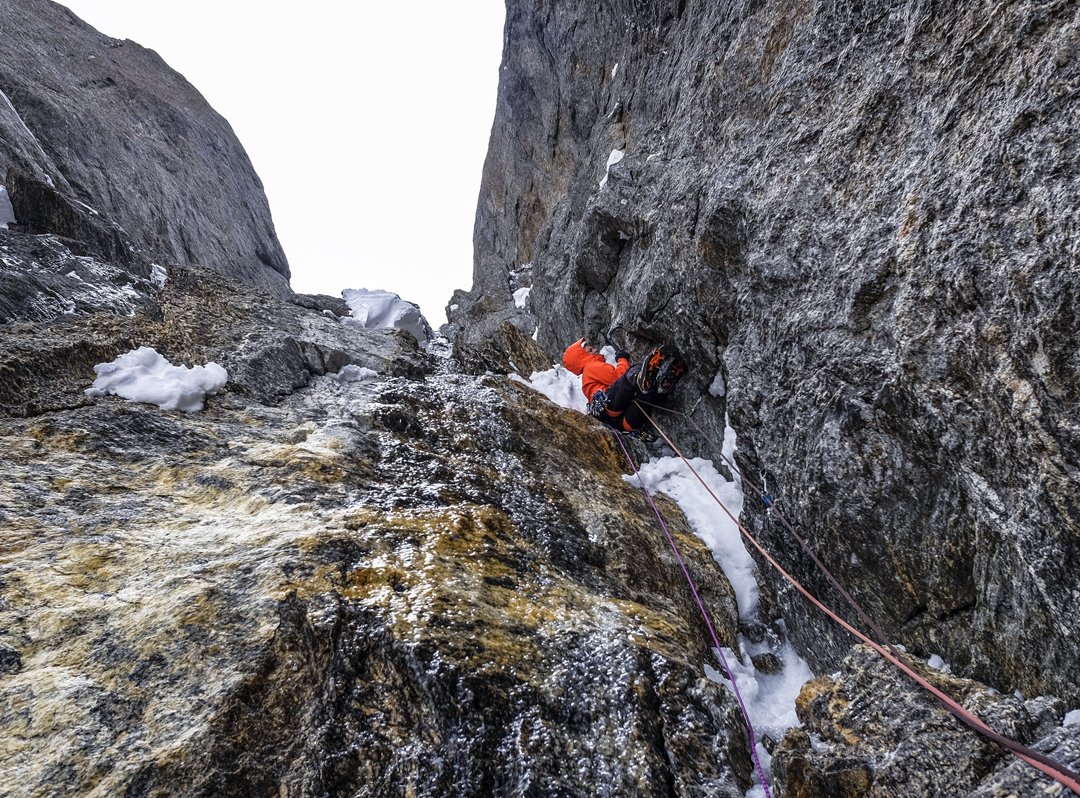 Prezelj starting the third pitch on the second day of All or Nothing. Here the snow became wet and the climbing very interesting, reminding Prezelj of mixed climbing in Alaska or Scotland. [Photo] Urban Novak