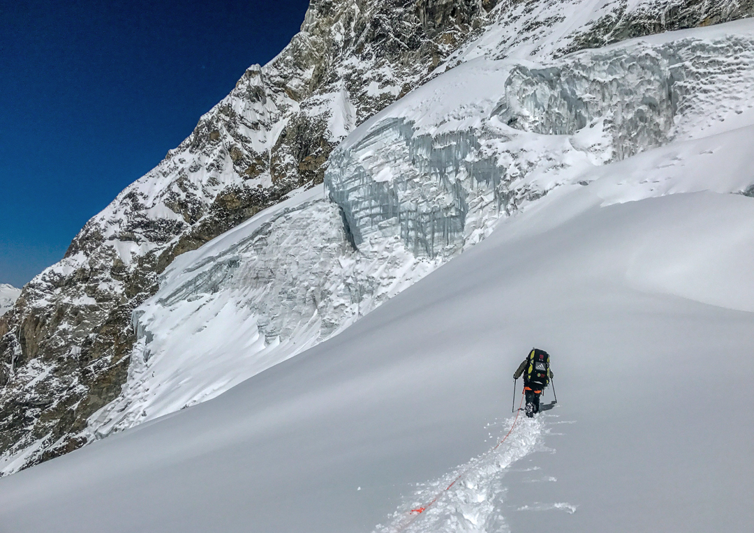 Descending from 5800 meters after two nights on Shalbachum. Later this day, Dusserre and Girard were able to stamp out a runway and escape the face by paraglider. [Photo] Dusserre/Girard Collection
