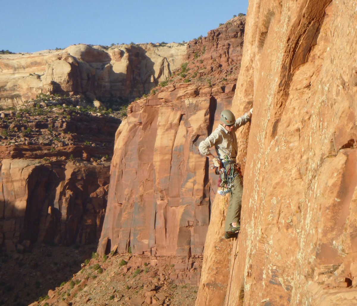John Tucker plugs gear on Evening Ecstacy (5.9+) in Indian Creek, 2015. [Photo] Derek Franz