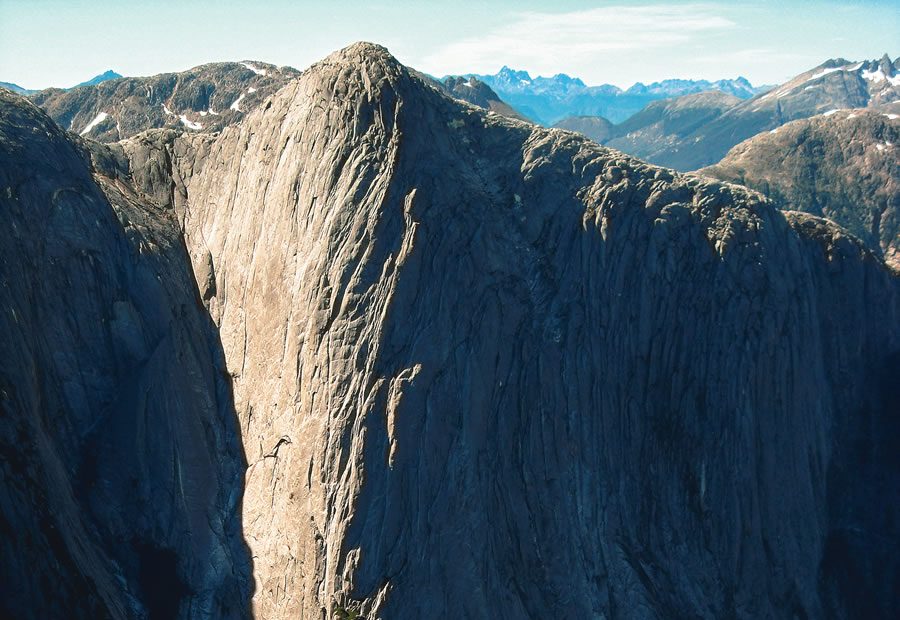 El Hermano (ca. 4,500), Chile. In 2014 Libby Sauter's team mostly followed the sun-shadow line, and then cut to the right a few hundred feet from the top. [Photo] Doug Tompkins
