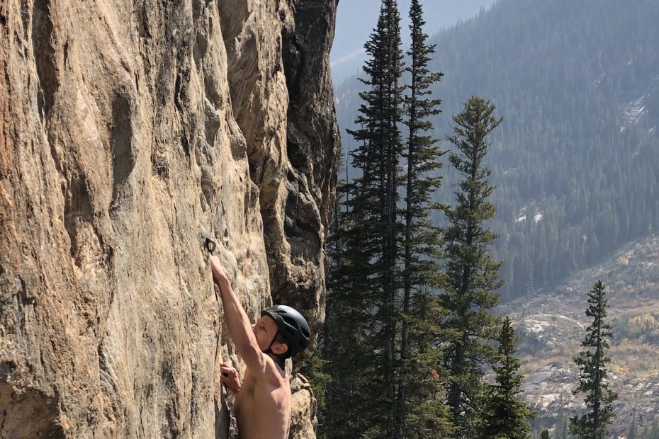 Derek Franz stays relaxed wearing the Black Diamond Vision MIPS helmet while onsighting Rock Candy (5.12a), a thin slippery route on Independence Pass, Colorado. [Photo] Elizabeth Riley