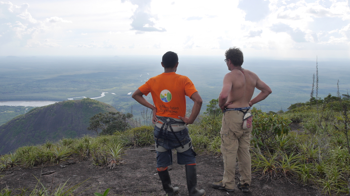 Benegas (right) on top with Parmeno, from the village of Remanso, who climbed 5.10b using borrowed gear to reach the summit of his first technical climb on Cerro Parajito in 2015. [Photo] Courtesy of Benegas Brothers Productions