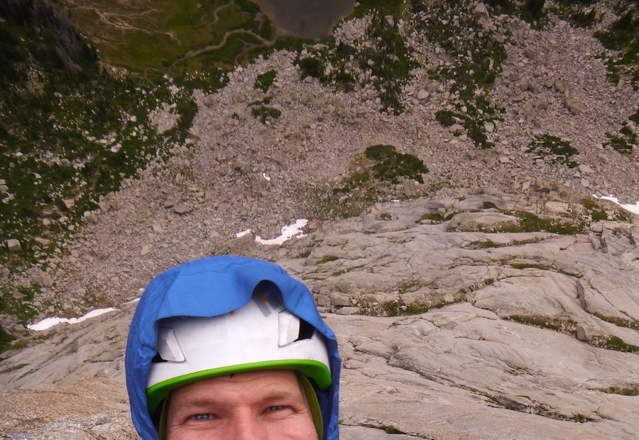 Derek Franz and friends avoiding the usual mule train of climbers on Pingora's Northeast Buttress (5.8)--one of the Fifty Crowded Classics of North America--by climbing it in drizzly weather in 2019, Wind River Range, Wyoming. [Photo] Derek Franz