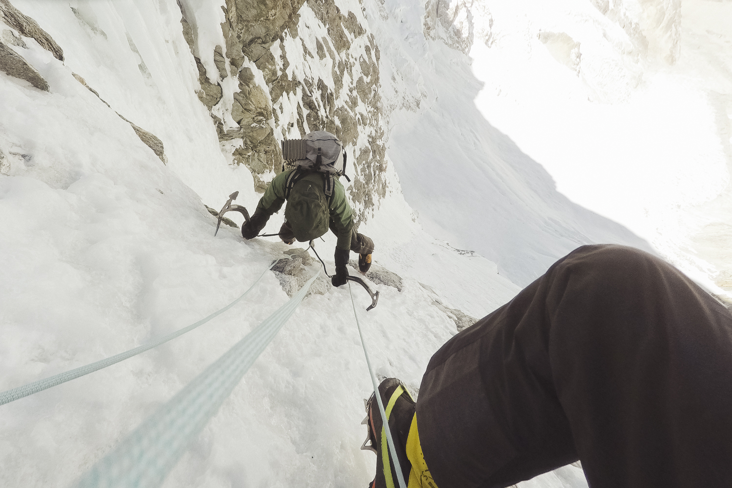 This photo was taken at around 6550 meters, with Blumel following the final moves of the short rock section. [Photo] Hansjorg Auer