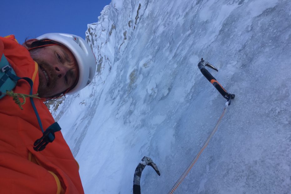 After a long rightward traverse on the second ice band, climbing some moderate ice to join the Bjoernberg-Ireland route. [Photo] Colin Haley