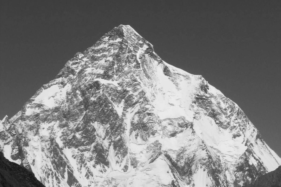 K2 (8611m) is pictured here in summer. The Abruzzi Spur—the route used by all the expeditions this winter—follows the right-hand skyline. [Photo] Svy123, Wikimedia Commons