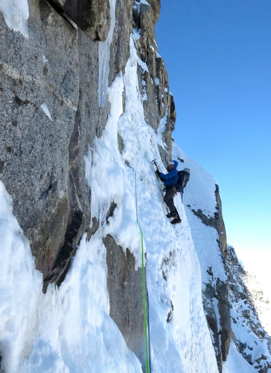 Fowler climbing on the North Buttress of Sersank Peak. [Photo] Victor Saunders