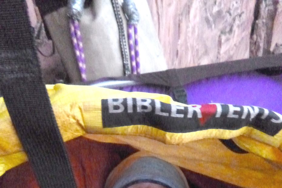 The author enjoys the comfort of the Mountain Equipment Xeros 800-fill, Russian Goose Down sleeping bag inside his bivy sack on the second morning of his solo ascent of Prodigal Sun (V 5.7 C2, 900') in Zion National Park, October 22. [Photo] Derek Franz