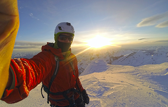 The author on the summit of Mt. Robson after soloing the Emperor Face in 2016. [Photo] Marc-Andre Leclerc