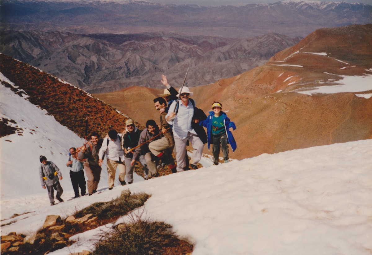One of the author's childhood memories. Shabestari's father leads the group while holding her cousin's hand. Shabestari writes, That is exactly how I used to climb with dad and his friends. [Photo] Shirin Shabestari collection