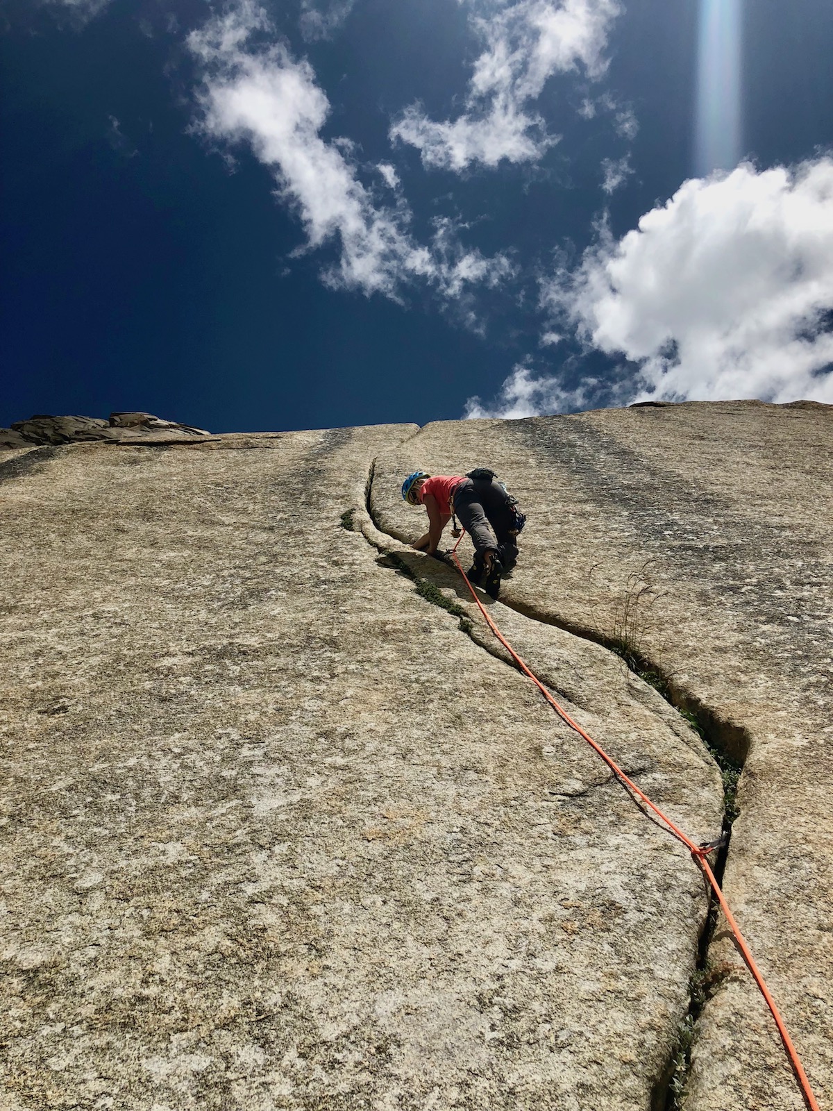 Anna climbs one of many excellent golden splitter cracks near base camp.  [Photo] Andres Marin