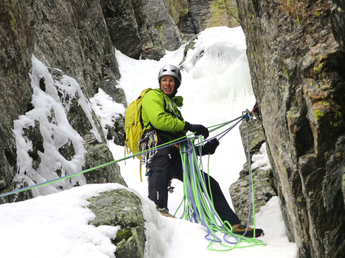 The author belaying on a reworked fixed anchor on Hallett Chimney (AI5, M5), Rocky Mountain National Park, CO. [Photo] Mark Arlinghaus
