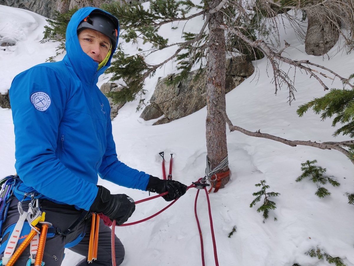 The author uses the Trango Vergo to belay his partner off a tree anchor on Three Tiers, an ice route near Copper Mountain, Colorado. [Photo] Slava Lototskyy