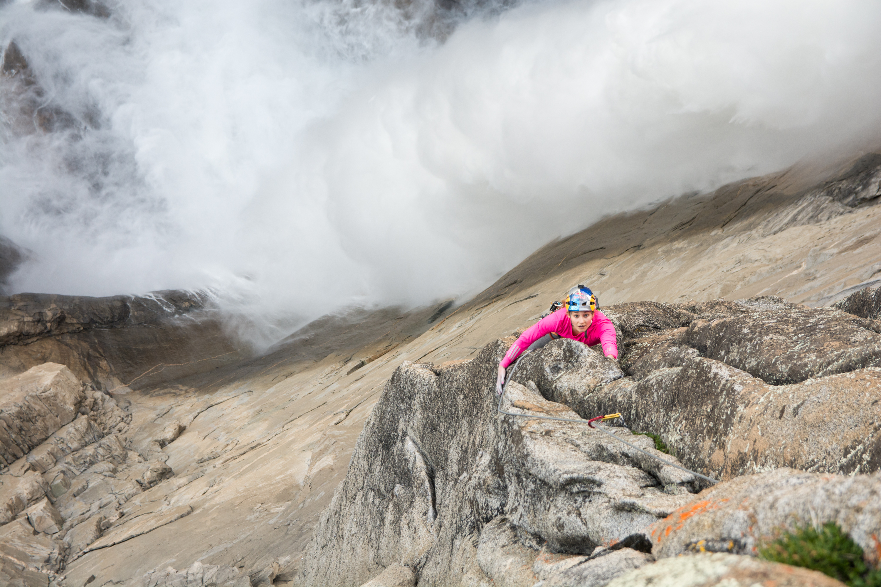 DiGiulian hangs on to send the 5.12 splitter on Pitch 13 on the Misty Wall as Yosemite Falls roars in the background. [Photo] Marcus Garcia