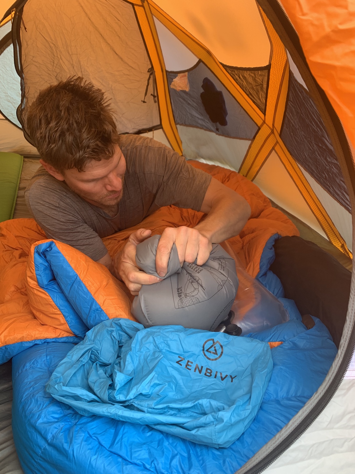 Franz inflating the Zenbivy Light pillow. [Photo] Mandi Franz